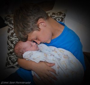 Luke meeting his baby cousin last year.